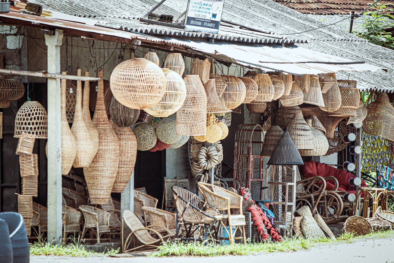 Explore the vibrant display of handmade wicker and rattan crafts at the Weweldeniya market.